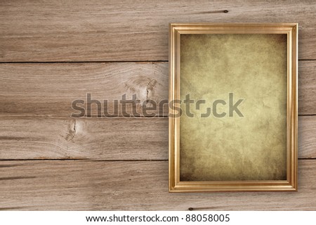 vintage portrait frame on old wooden background