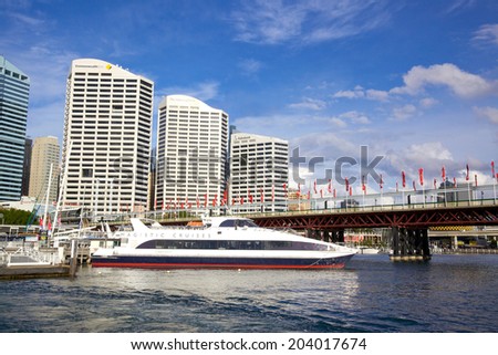 SYDNEY, AUSTRALIA - MAY 20, 2010: Office blocks overlooki Darling Harbour, a harbour and recreational and pedestrian precinct adjacent to the city centre of Sydney in New South Wales.