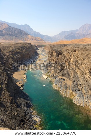 Water has cut through desert rock to create Wadi Dyqah, one of the most beautiful natural landscapes in the Sultanate of Oman.