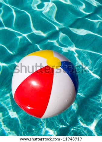 Pool Water With Beach Ball beach ball floating in swimming pool. stock photo 11943919 Pool Water With Beach Ball beach ball floating in swimming pool. stock photo 11943919