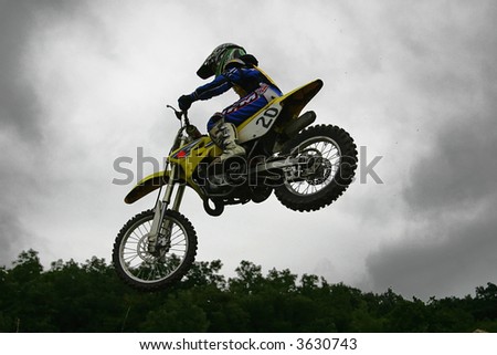 Jumping motocross bike at a junior EC competition in Hungary