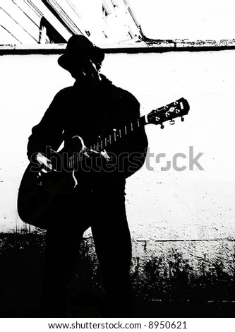 black and white guitar player. stock photo : Guitar player without face - black and white.