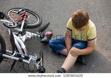 fell down of his first bike on road.