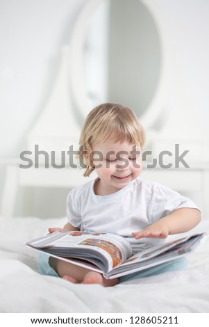 happy boy read book