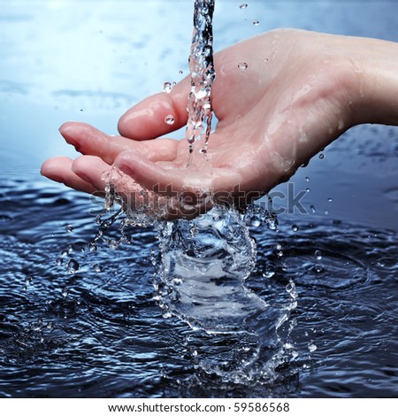 water stream on woman hand