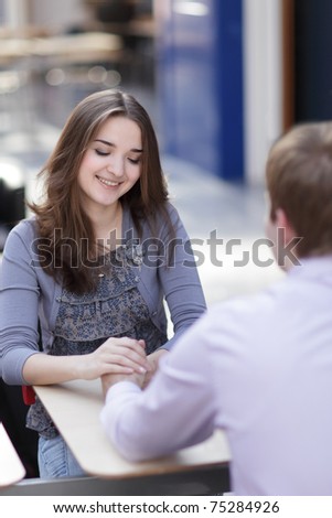 young couple in cafe