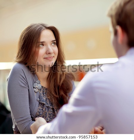 young couple in cafe rendezvous