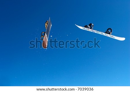 Snowboard on the blue sky