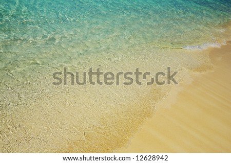 Nice blue water ripples near a shore in the Indian Ocean