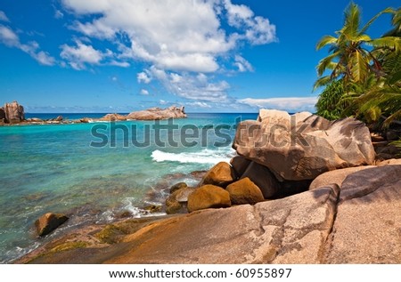 Dream seascape view with a big stones and palmtree, Seychelles, La Digue island
