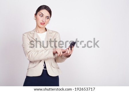 young woman holding a phone