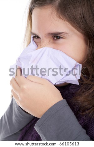 Beautiful girl with a cold blowing nose