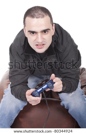 stock-photo-furious-young-man-with-a-joystick-for-game-console-80344924.jpg