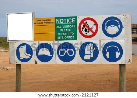 Instructional sign at a construction site advising the workers and visitors