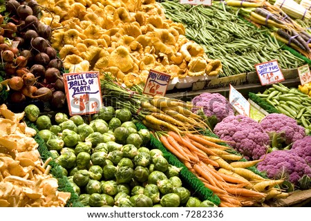 Various fresh vegetables form this colorful produce display
