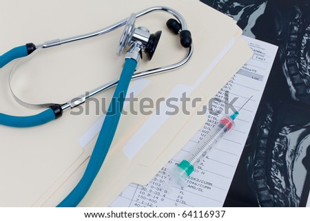 Medical Records, Stethoscope, syringe, MRI exam, blood test results folder