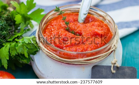 tomato sauce on glass bottle with label