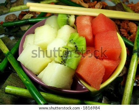 asian fruits tray whit flowers and bamboo