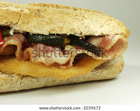 Breaded chicken breast whit bacon and vegetables wholemeal bread supersandwich