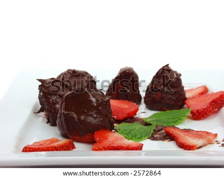 sweet strawberry dipped on chocolat with mint leaves