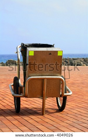 steel garbage collector near the beach