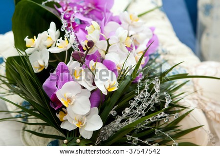 stock photo bridal bouquet with white orchid and glass pearls
