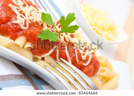 italian food pasta with tomato cheese and parsley