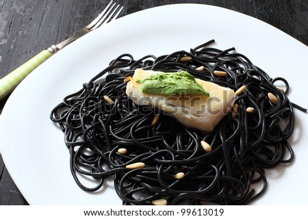 black tint spaghetti with parmesan green sauce