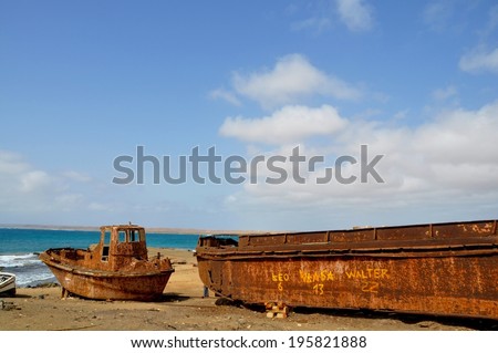 old rusty boats at salt mine in sal, cape verde