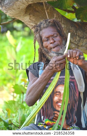 CASTRIES, ST. LUCIA, SEPTEMBER 16: An unidentified man in St. Lucia making handcraft on SEPTEMBER 16, 2014 in Santa Lucia