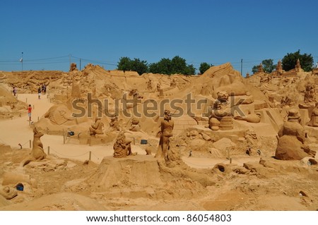 PERA, PORTUGAL-JULY 9:Overview of sand sculptures at FIESA, International  Sand Sculpture Festival in Pera, Portugal on July 9, 2011.