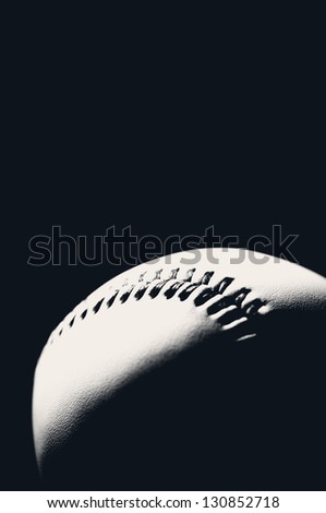 Vertical shot of a baseball ball, black and white, copyspace