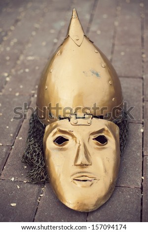 Medieval slavic helmet with a face mask, vertical shot
