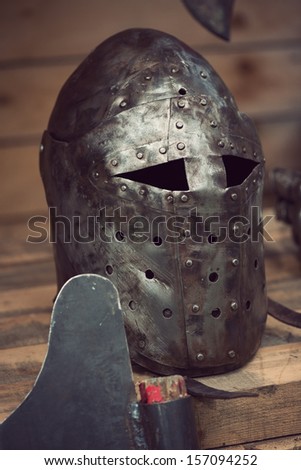 Iron medieval helmet, close-up, vertical shot