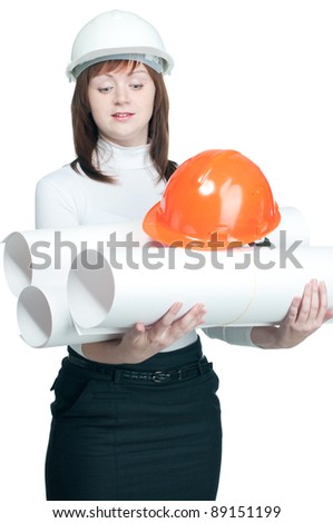 Puzzled female engineer holding blueprints rolls and hard-hat, white background