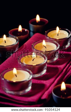 Stills: burning votive candles