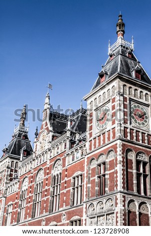 Holland, Amsterdam, view of the Central Railway Station facade ( HDR image )
