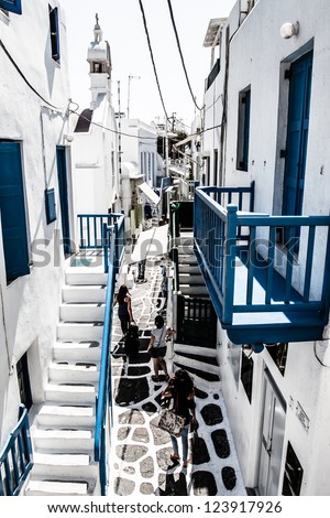 A typical narrow alley in the town of Mykonos, Greece ( HDR image )