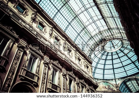 Glass dome of Galleria Vittorio Emanuele II shopping gallery. Milan, Italy.
