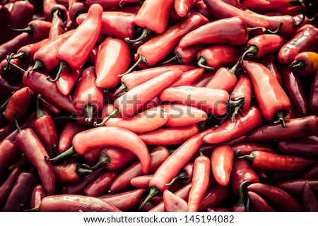 Red paprica in traditional vegetable market in India.