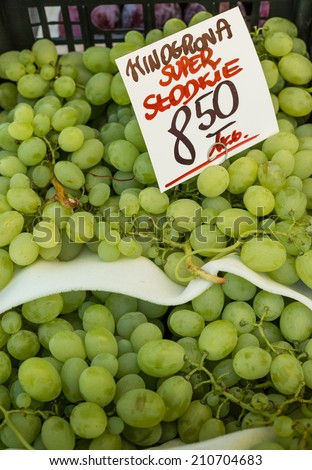 Grapes for sale in a basket on a open air market stall Grapes for sale in a basket on a open air market stall in Poland.