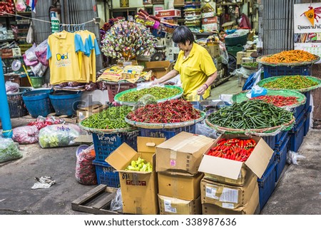 BANGKOK, THAILAND - NOVEMBER 07, 2015: Unidentified people transport purchases from the market in Bangkok, Thailand.