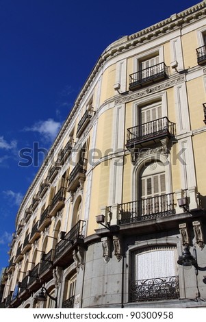 Mediterranean architecture in Spain. Old apartment building in Madrid.
