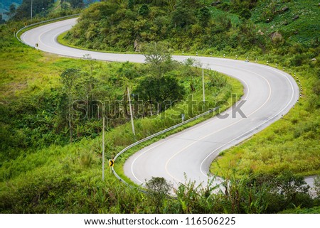 The road curves up the mountain