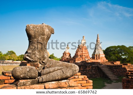 Buddha Status no head at Wat Chaiwattanaram , Ayutthaya, Thailand
