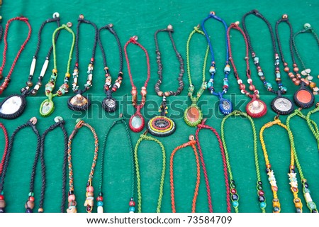 Necklace shown for sale at market, Thailand