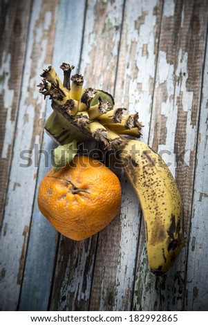 Old banana on a wooden table