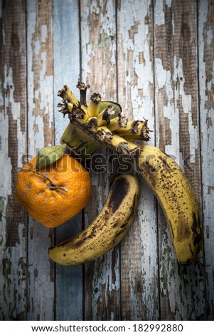 Old banana on a wooden table