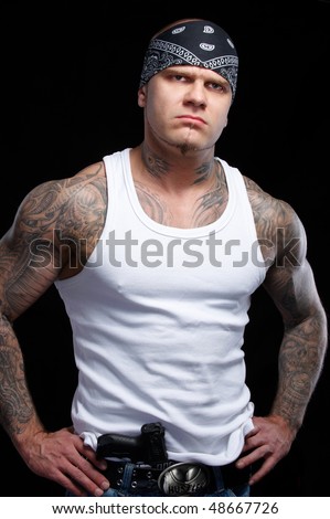 stock photo Tattooed gangster with gun tattoo gangster