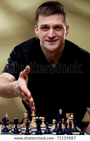 Chess player at a chess board